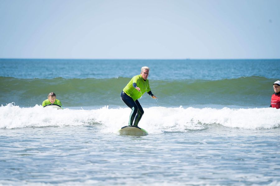 women on surf board