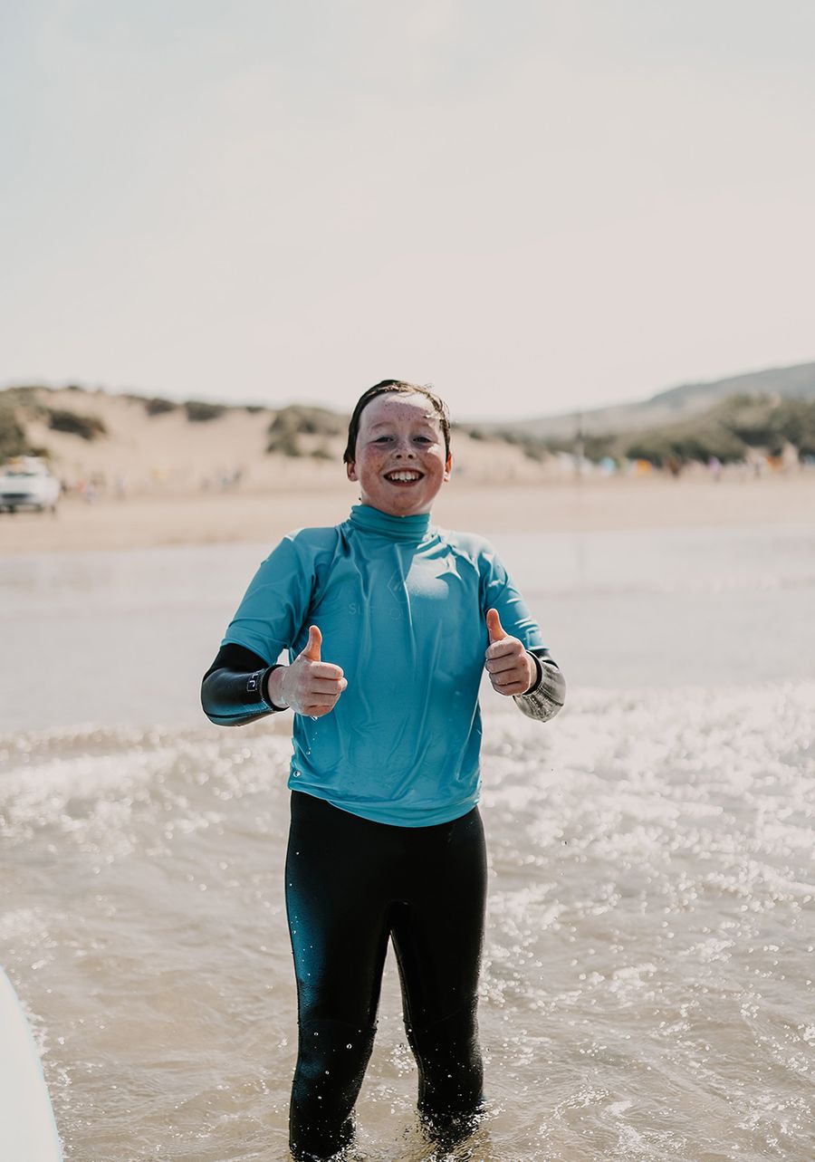girl enjoying surf lessons